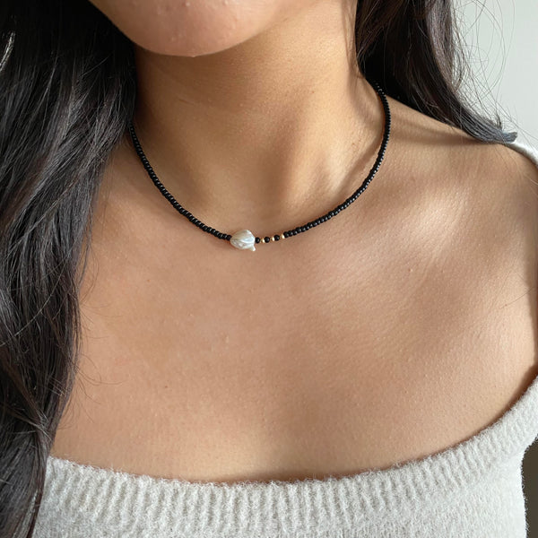 Black string and pearl necklace on sale