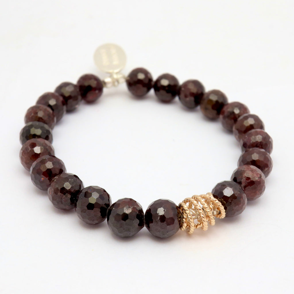Red garnet 8mm stone bead stretch bracelet featuring a 14k goldfill wire wrap bead over 2mm fine silver beads