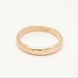 Gold ring on a white background