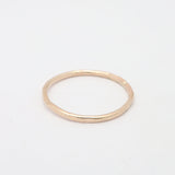 Gold ring on a white background