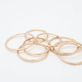 Gold rings on white background