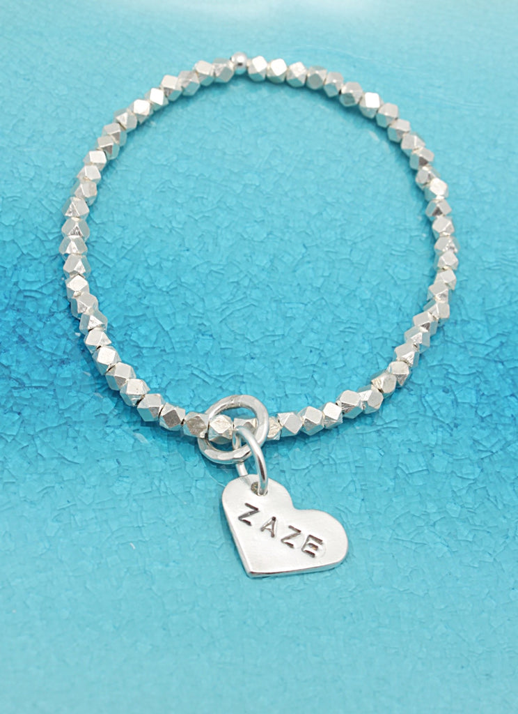 Sterling Silver Tiffany and Company Return to Tiffany Heart Charm Bracelet  with RARE Pink Cupcake Charm and Retired New York Fifth Ave Charm