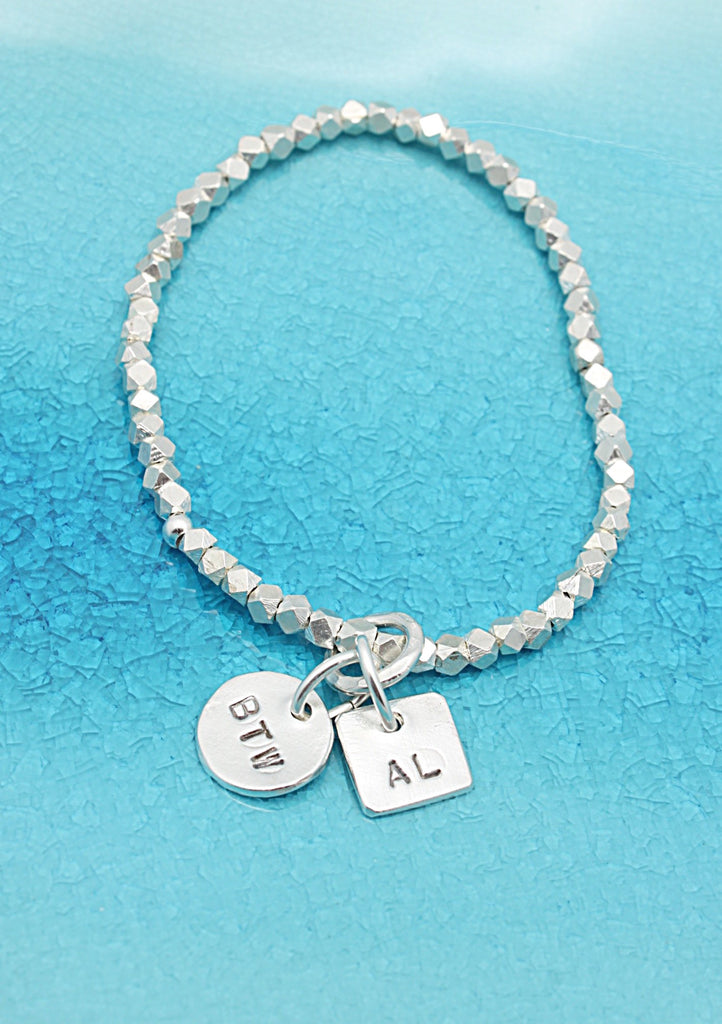 Silver stretch deals bracelets with charms