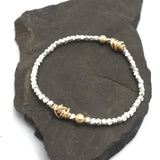 HERA Collection:  HERA Gold Wrapped Pendant & Fine Silver Stretch Bracelet
