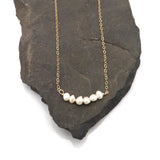 Micro Pearl Curve Necklace