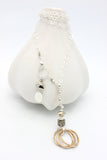 METAL GOLD Lariat Necklace with Entwined Bronze Ring Pendant