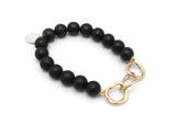 Matte Black Onyx Stretch Bracelet with Entwined Bronze Links