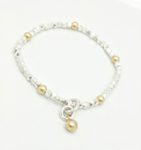 Arctic Blossoms: Fine silver Stretch Bracelet & Petite Bronze Bud Charm