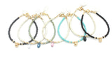 ARCTIC BLOSSOMS:  Ochre & Jet Black/Blue Briolette Bracelet