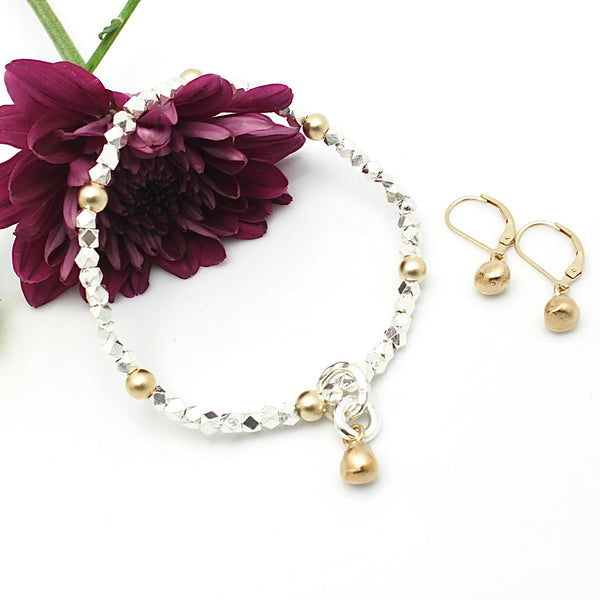 Arctic Blossoms: Fine silver Stretch Bracelet & Petite Bronze Bud Charm